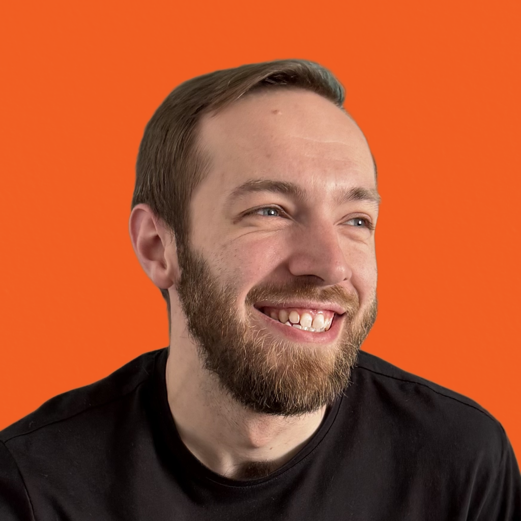Headshot 1 Orange Headshot of Jordan, the founder/designer